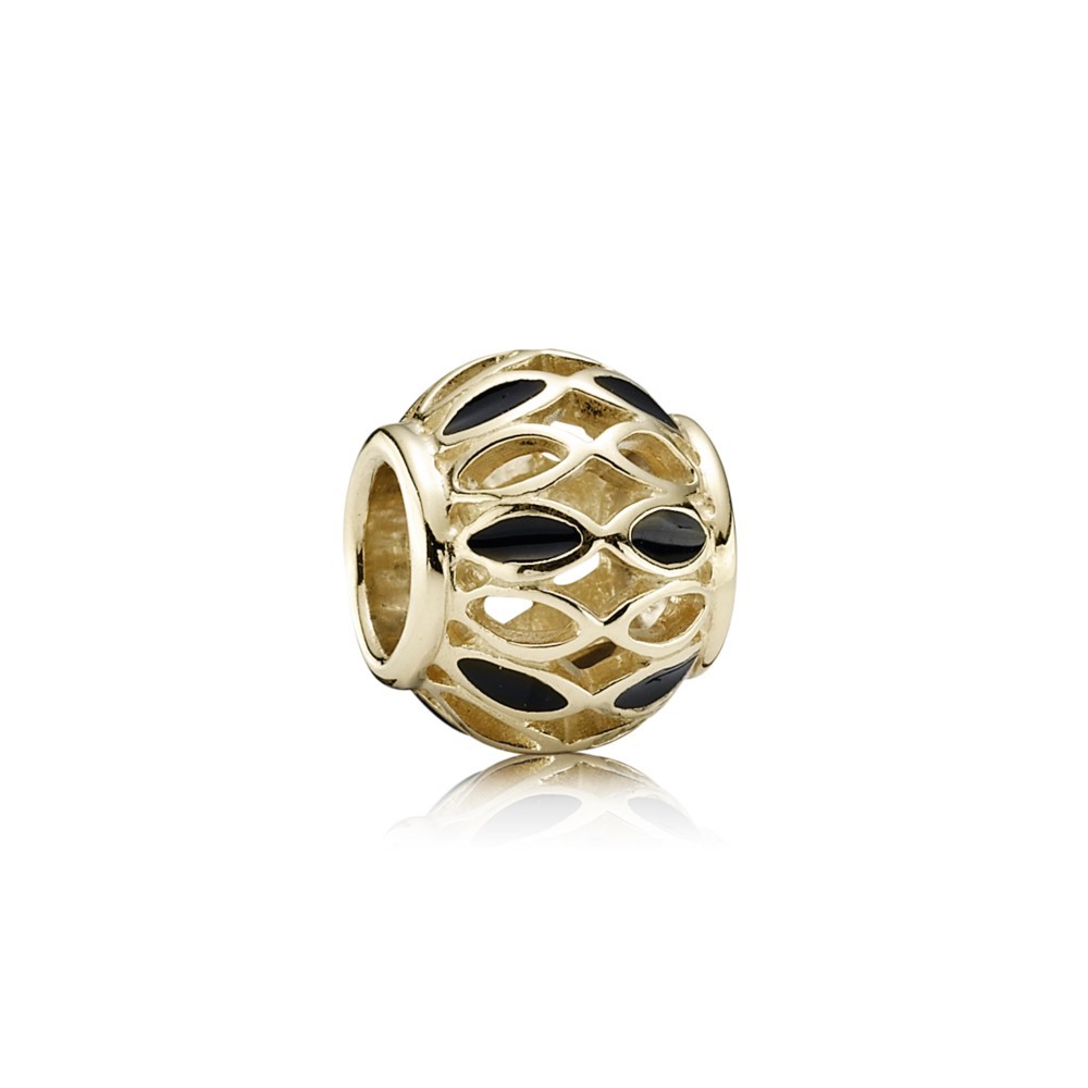 Abstract openwork gold charm with black enamel